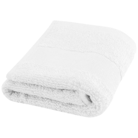 Serviette de bain publicitaire Sophia de 30 x 50 cm en coton de 450 g/m²