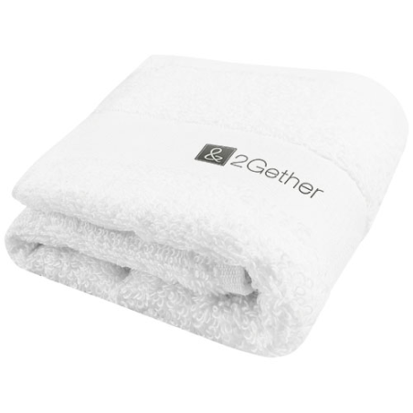 Serviette de bain publicitaire Sophia de 30 x 50 cm en coton de 450 g/m²